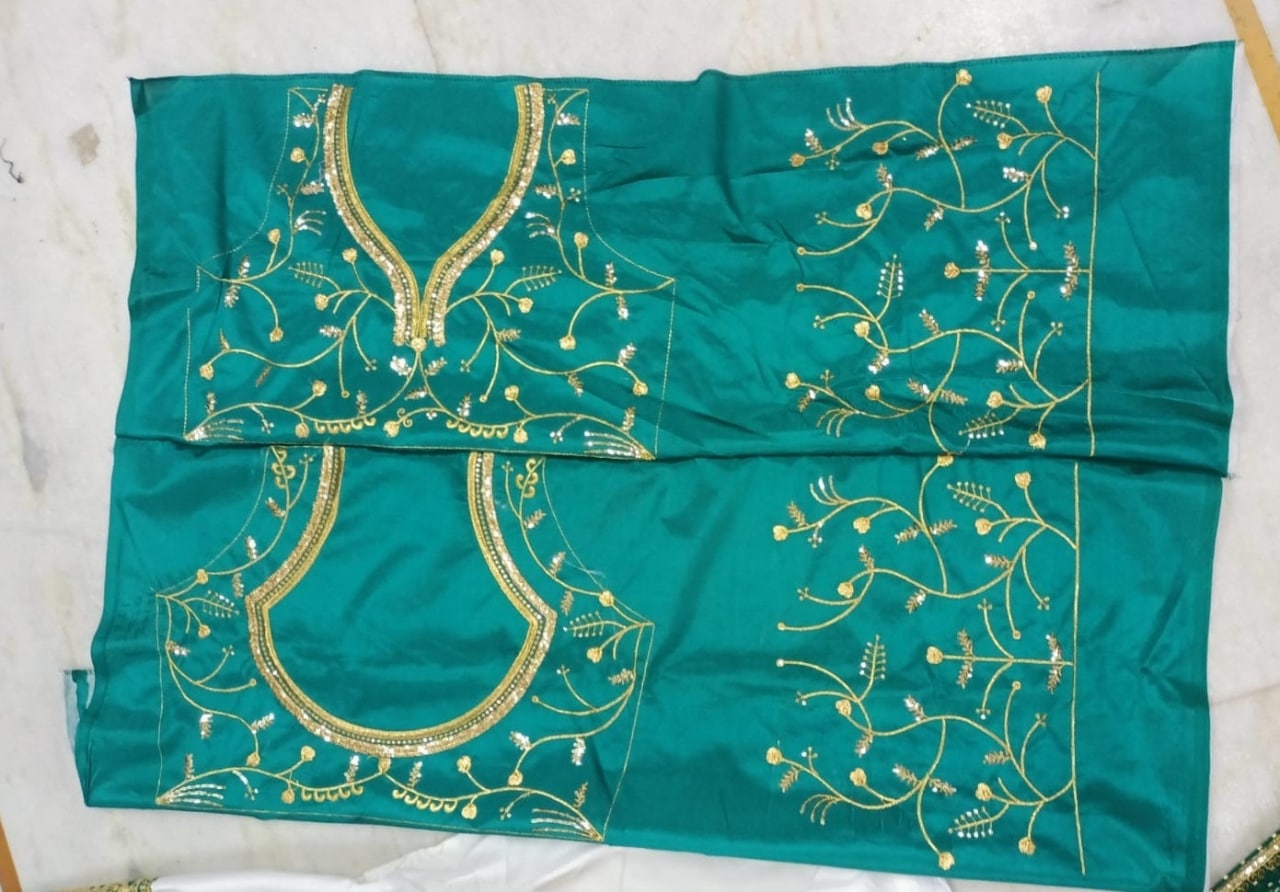 WHITE-TAPETA-SILK-GREEN-BORDER-WEDDINGLEHENGA