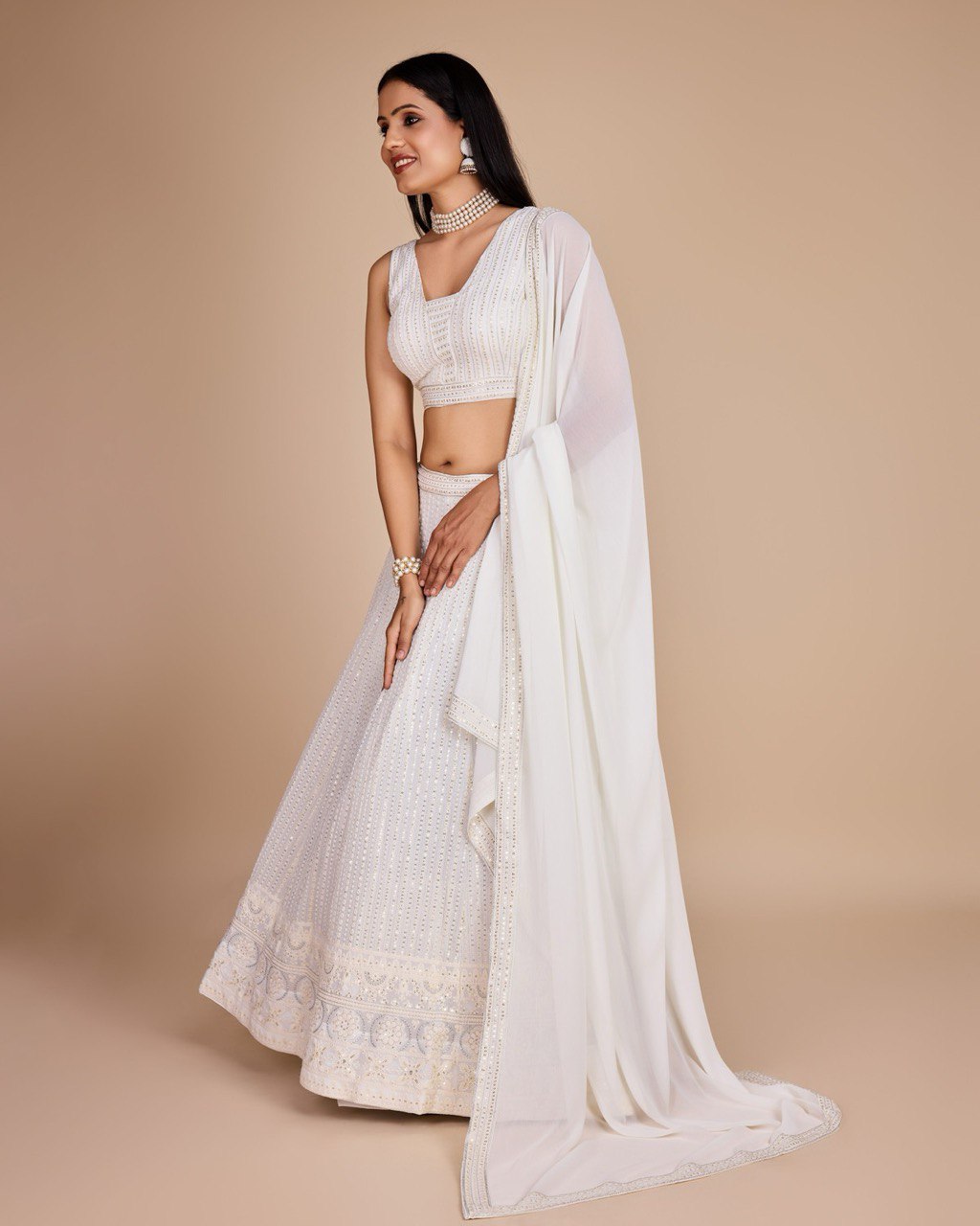 White Georgette Embroidered Sequins Lehenga With Choli And Dupatta Party Wear