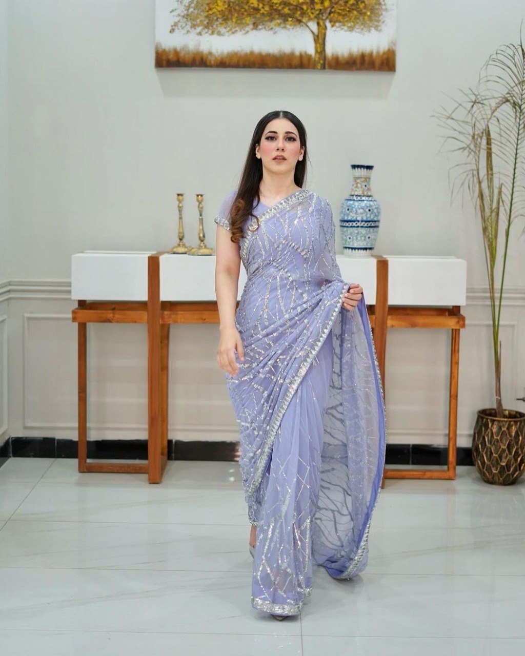 Magnificent light lavender colored designer sequence embroidered party wear saree