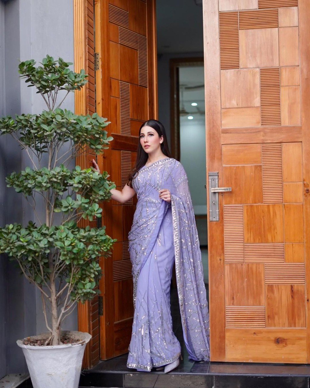 Magnificent light lavender colored designer sequence embroidered party wear saree