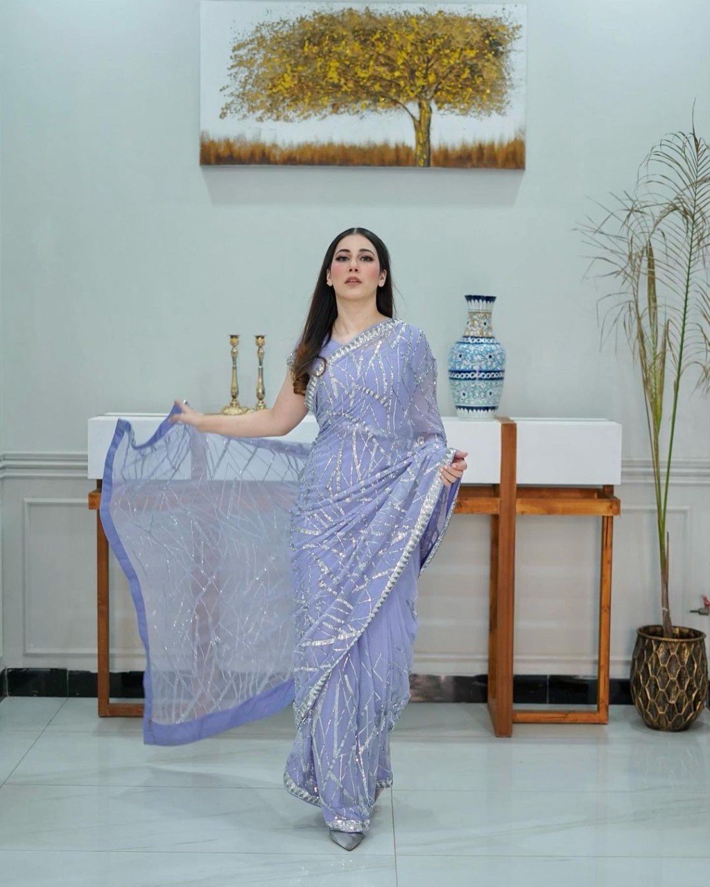 Magnificent light lavender colored designer sequence embroidered party wear saree