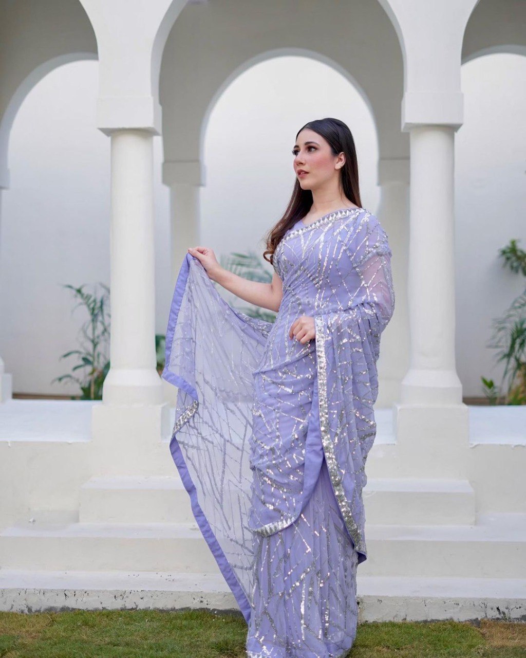 Magnificent light lavender colored designer sequence embroidered party wear saree