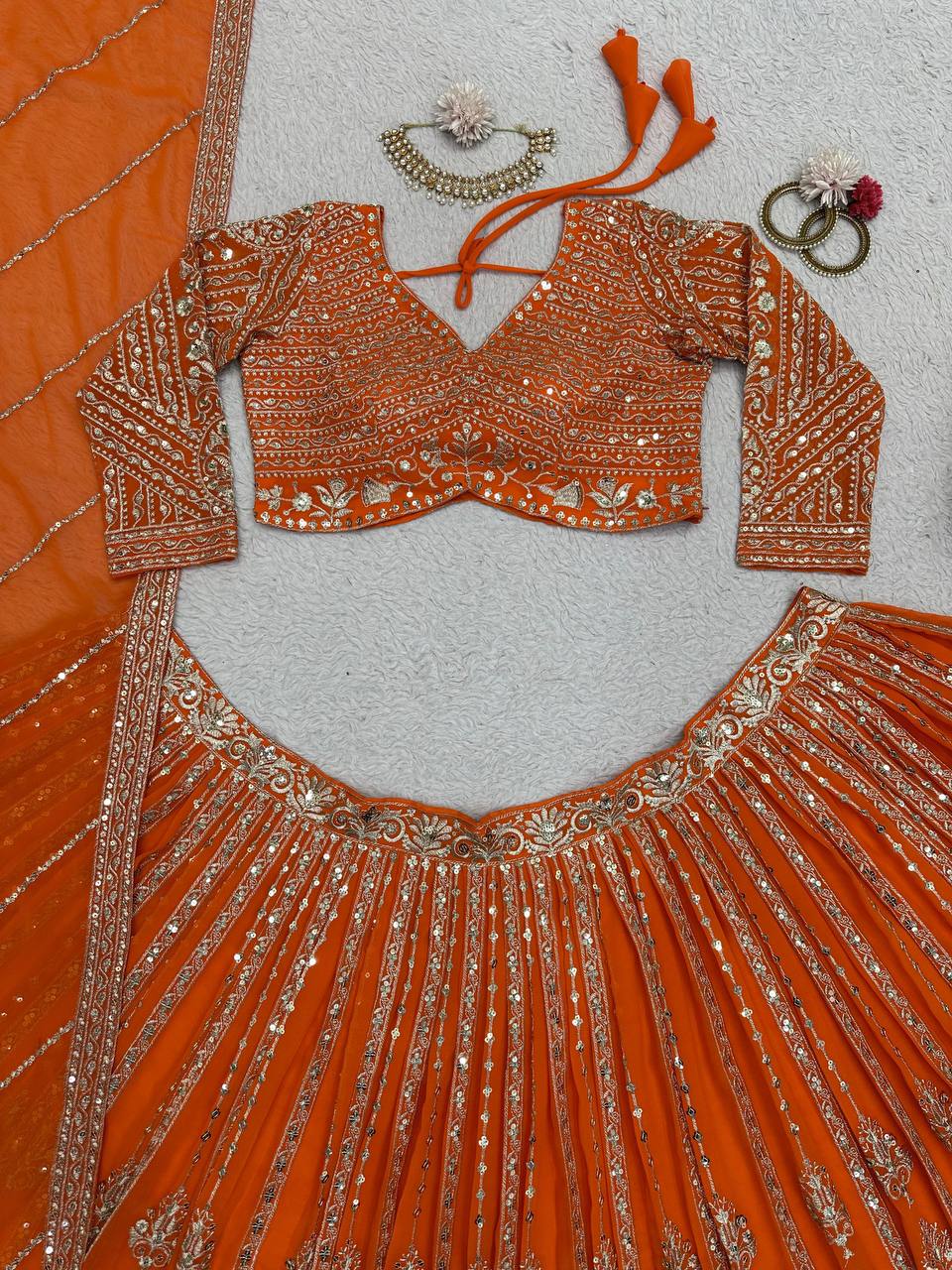 Indian Wedding Wear Orange Lengha Choli in Sequins Embroidered work Sabyasachi Lehenga